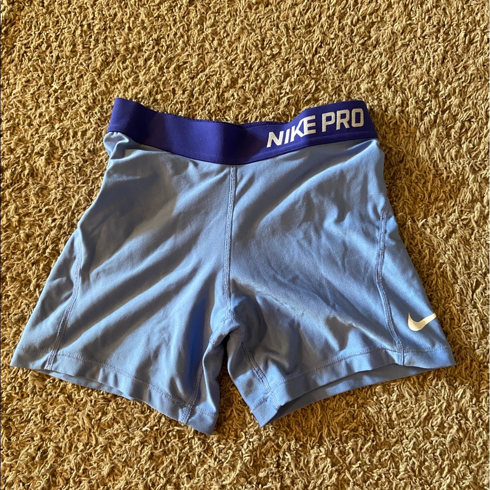 Youth large blue Nike pros
